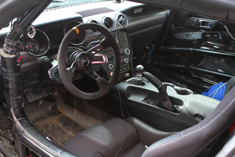 All the creature comforts you would need to drive your race car from Washington are here, including the cupholders.